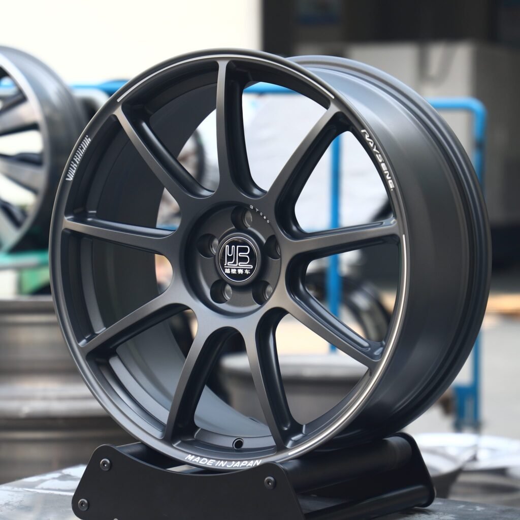 Toyota GR86 wheels – Rays Volk Racing Gloss Black / Gunmetal 9-Spoke, angled view