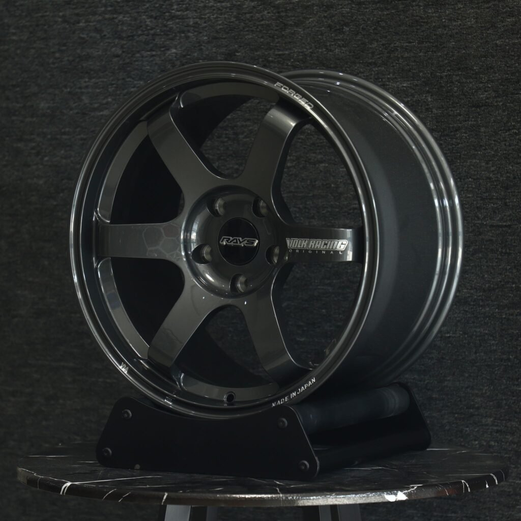 5x100 wheels – Gloss Black / Gunmetal 6-Spoke (Rays Volk Racing TE37-Style), side view