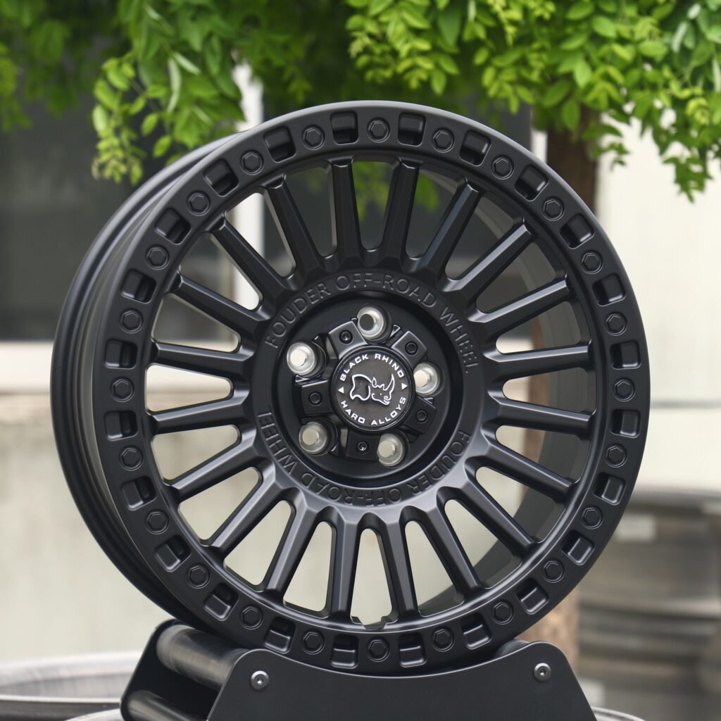 Toyota Land Cruiser wheels – Rhino Matte Black Exposed Bolt Detail, angled view
