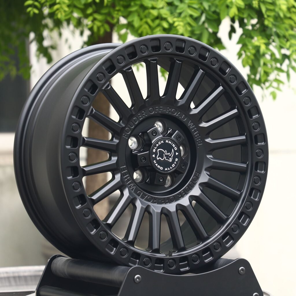 5x127 wheels – Rhino Matte Black Exposed Bolt Detail, side view