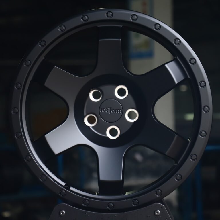 Toyota Tacoma wheels – Rotiform Gloss Black Exposed Bolt Detail, front view