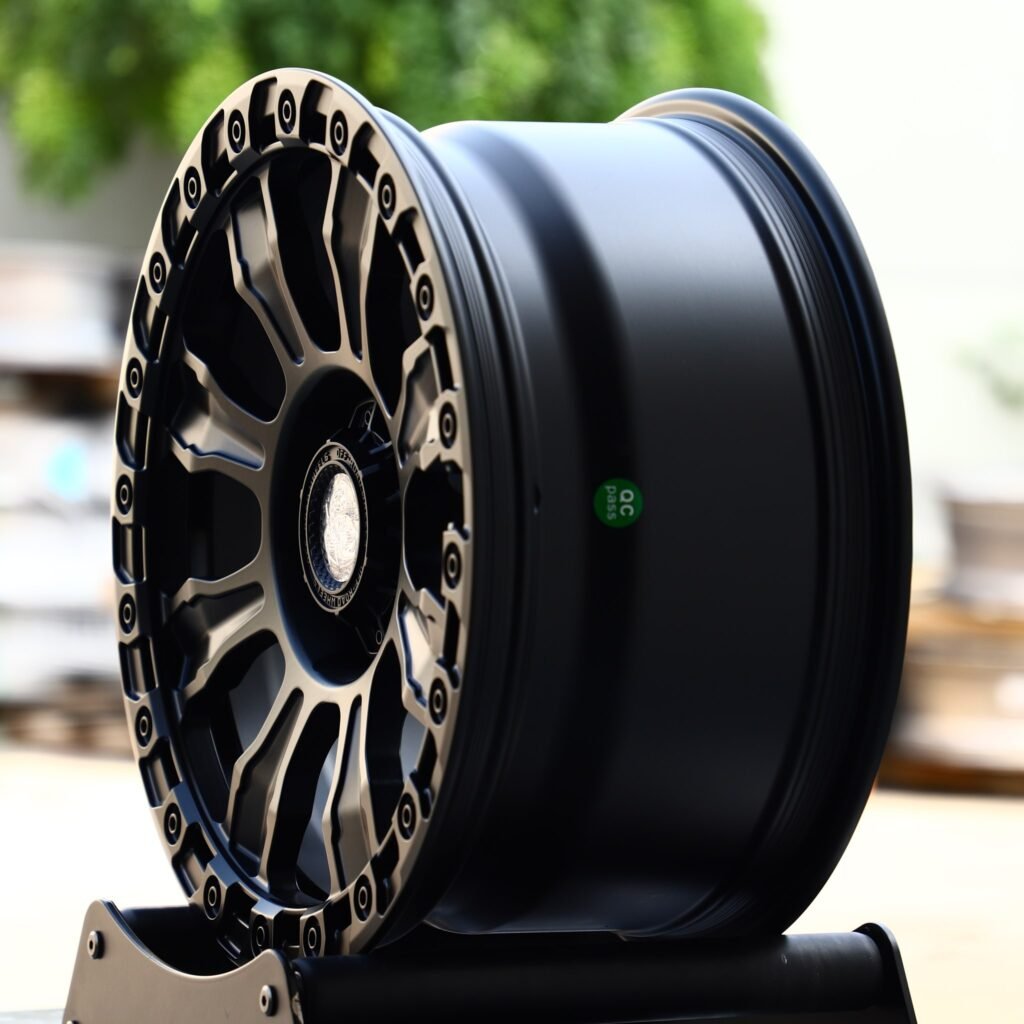 Toyota Tacoma wheels – Scorpion Gloss Black Exposed Bolt Detail, angled view