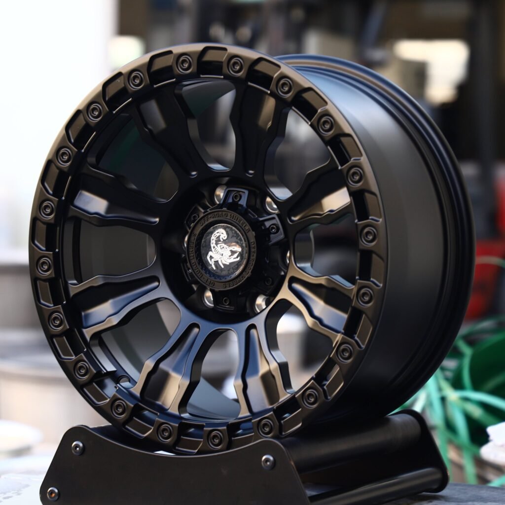 Chevrolet Silverado wheels – Scorpion Matte Black Exposed Bolt Detail, angled view