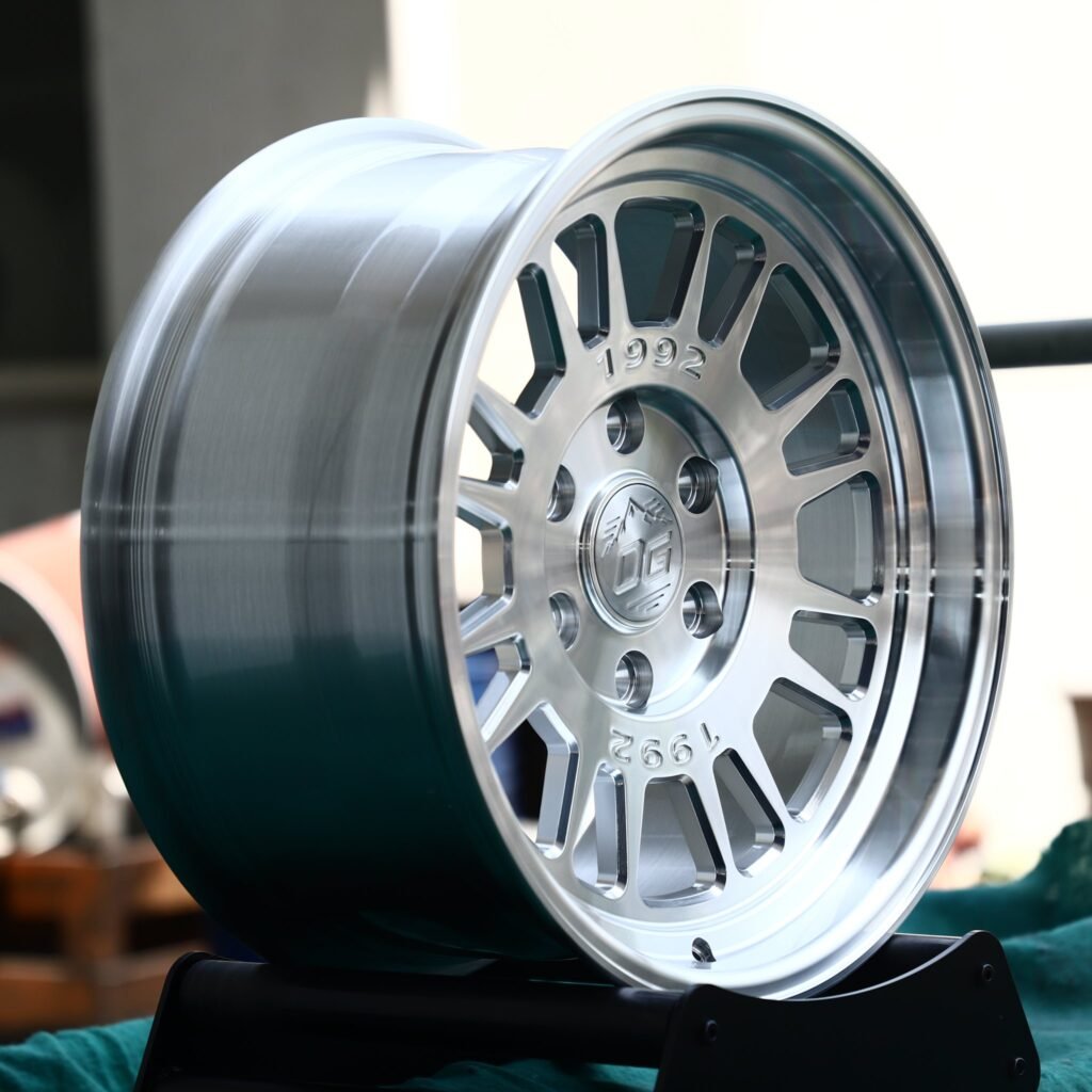 6x139.7 wheels – Mirror Polished 15-Spoke, side view