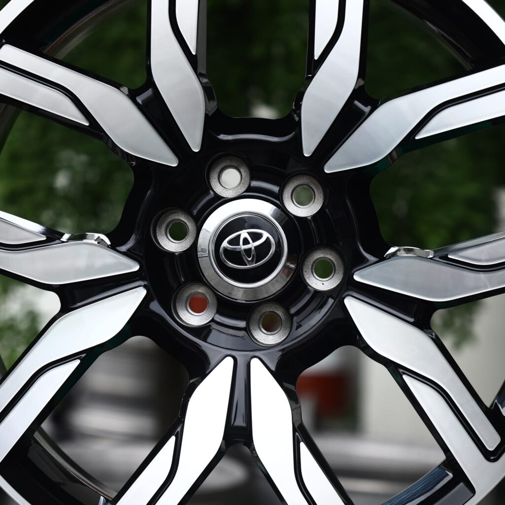 Toyota Tacoma wheels – Gloss Black / Machined 5 Split-Spoke (Toyota OEM-Style), lip and barrel detail