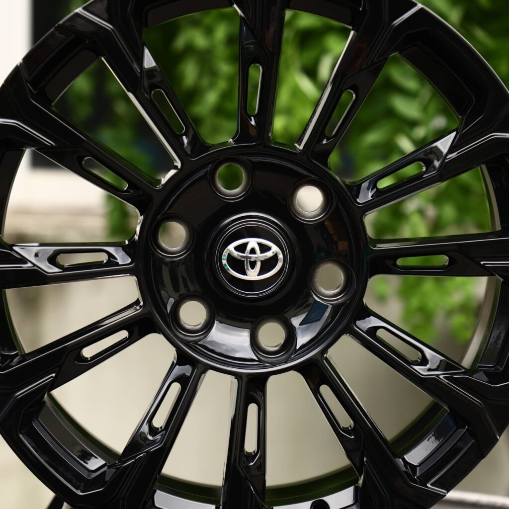 6x139.7 wheels – Gloss Black Directional, side view