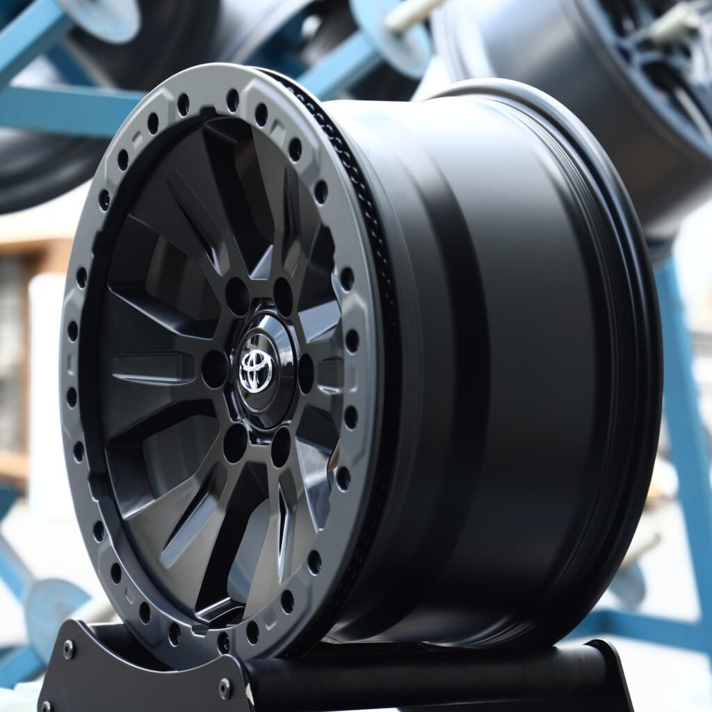 6x139.7 wheels – Gloss Black / Gray, side view