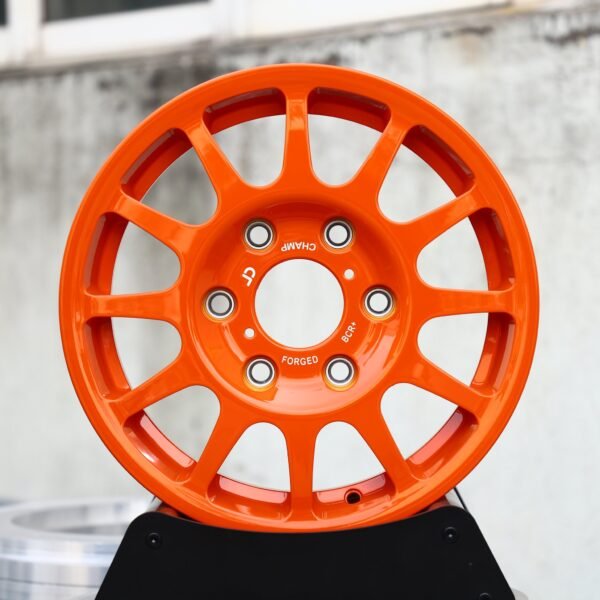 Toyota Tacoma wheels – Orange 12-Spoke, front view