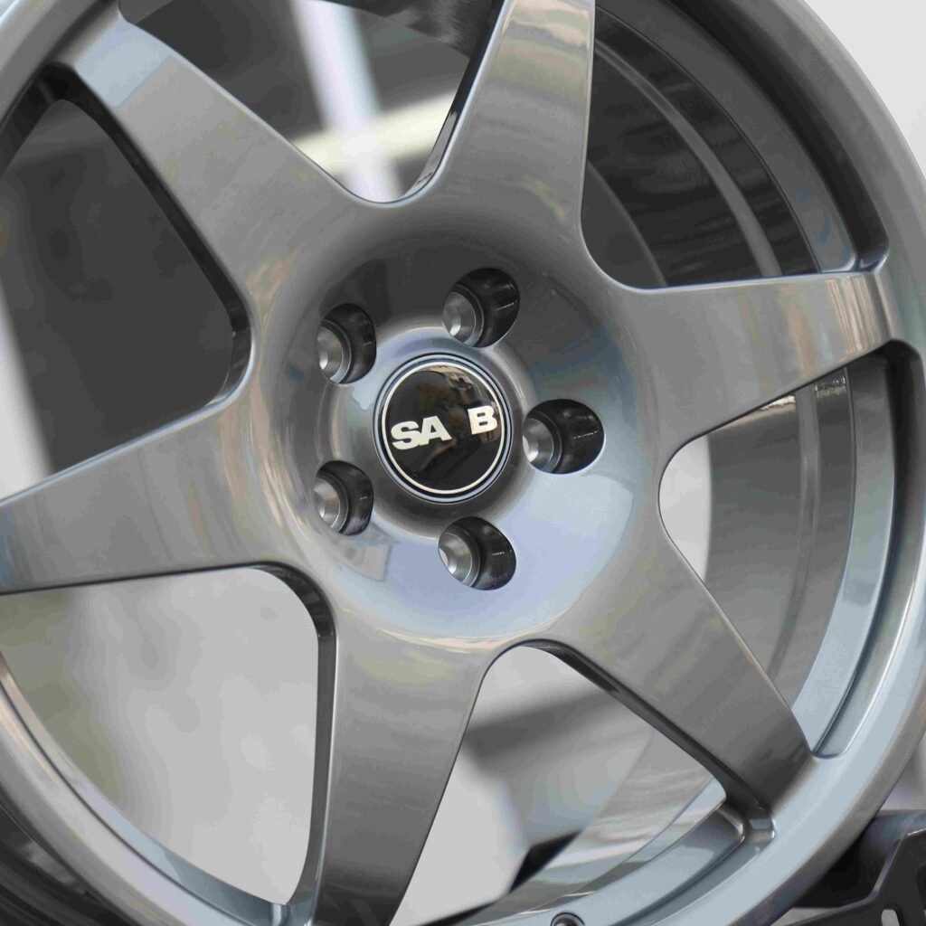 Saab 9-3 wheels – Transparent Gray 6-Spoke Side-Milled (Saab OEM-Style), lip and barrel detail