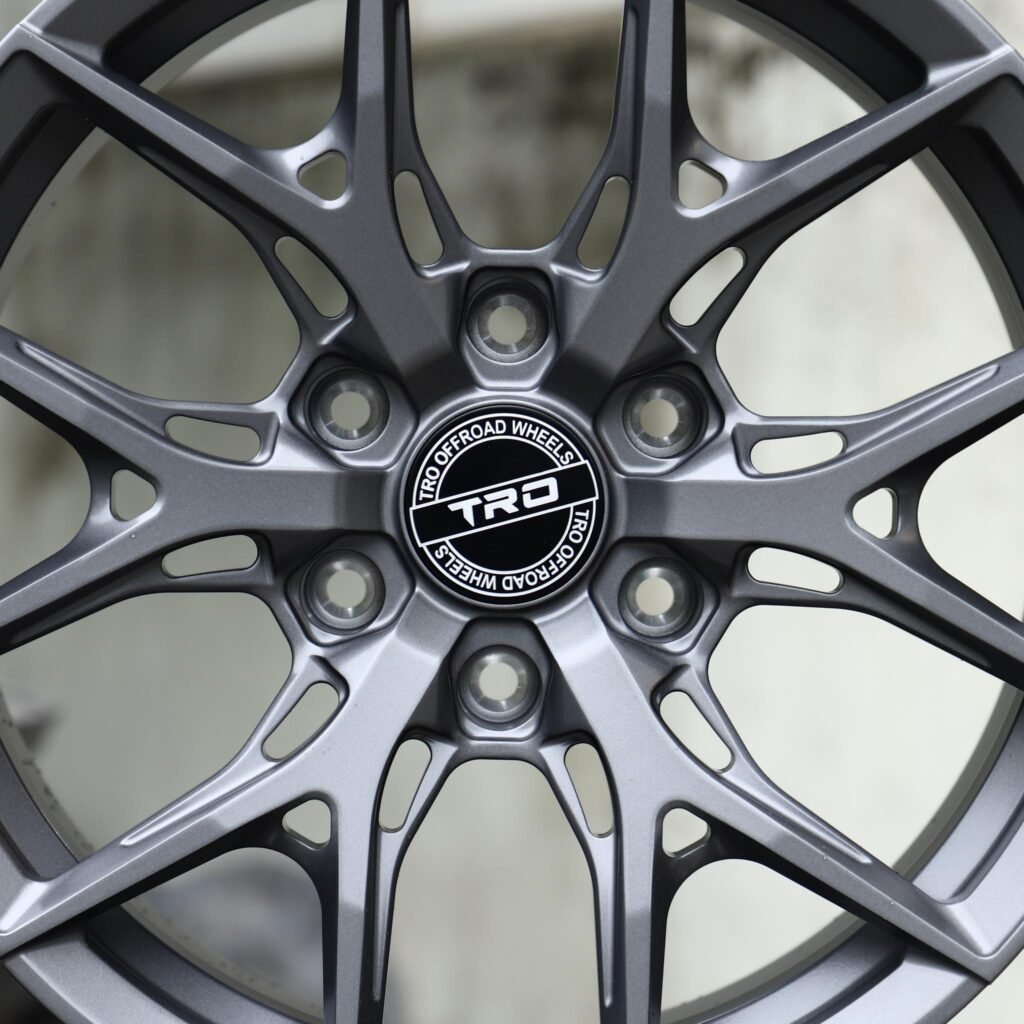 Toyota Tacoma wheels – Matte Gunmetal 6 Split-Spoke (TRO Offroad-Style), lip and barrel detail