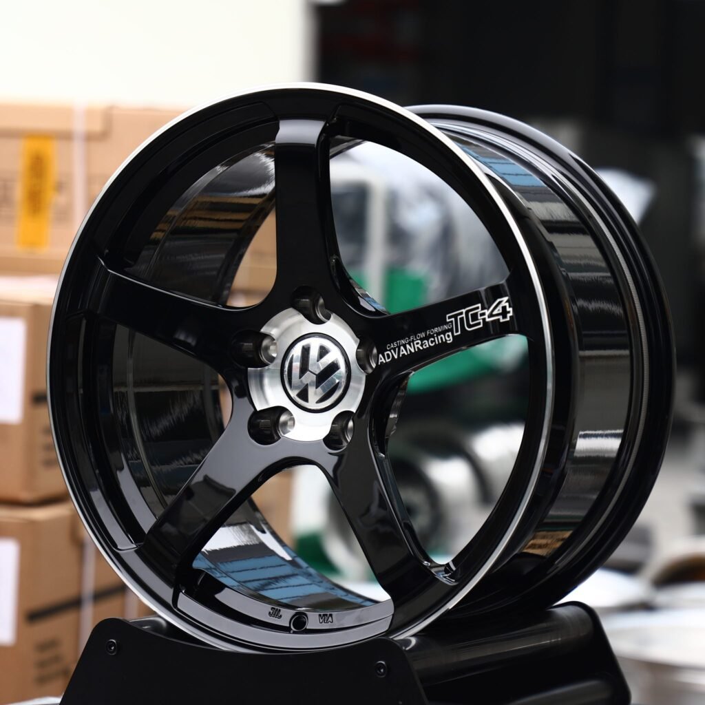 Volkswagen Tiguan wheels – Gloss Black 5-Spoke Machined Deep Lip (Volkswagen OEM-Style), angled view