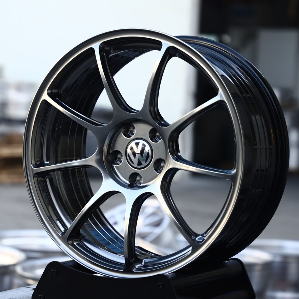 Volkswagen Tiguan wheels – Gloss Black Machined 10-Spoke (Volkswagen OEM-Style), angled view