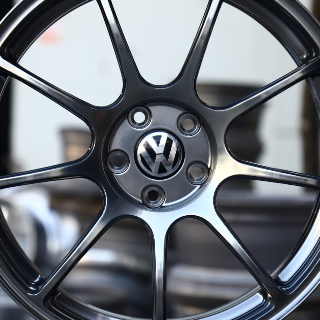 Volkswagen Golf wheels – Gloss Black Machined 10-Spoke (Volkswagen OEM-Style), lip and barrel detail