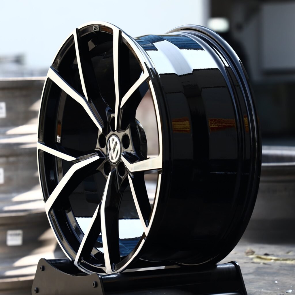 Volkswagen Golf wheels – Black / Machined 5 Twin-Spoke (Volkswagen OEM-Style), lip and barrel detail