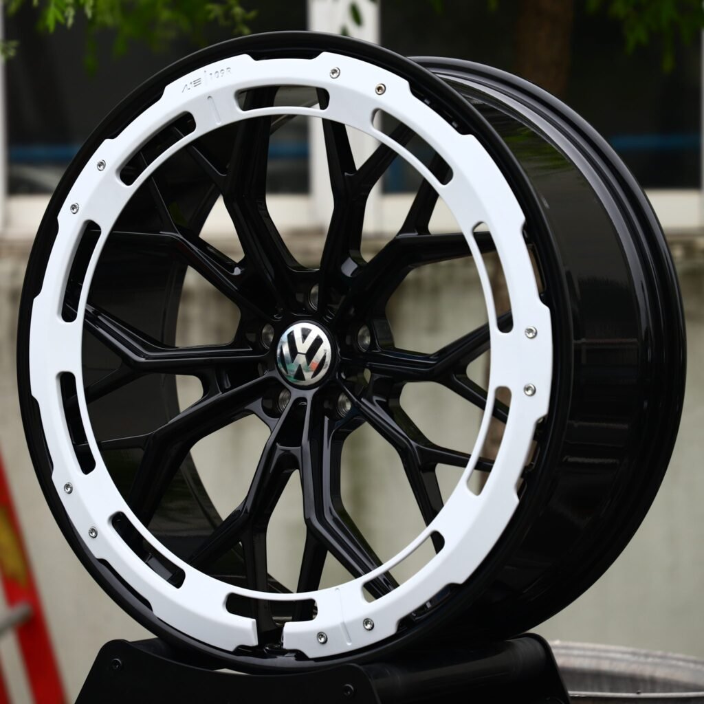 Volkswagen Tiguan wheels – Gloss Black Mesh White Ring Lip (Volkswagen OEM-Style), angled view