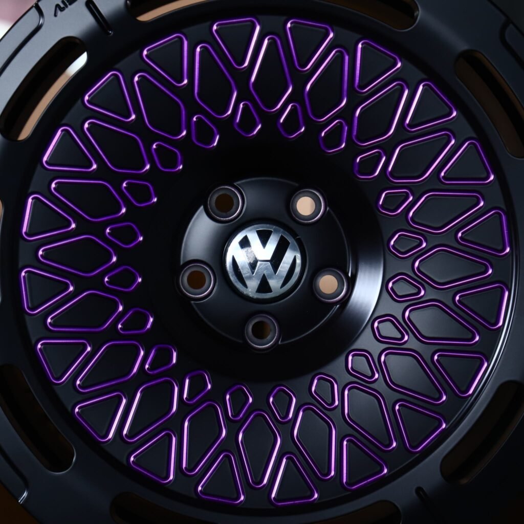 Volkswagen Golf wheels – Matte Black / Purple Lattice Mesh (Volkswagen OEM-Style), lip and barrel detail