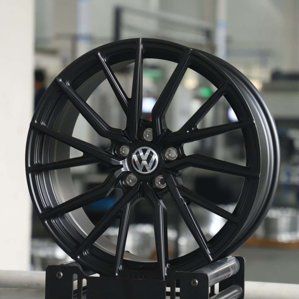 Volkswagen Tiguan wheels – Gloss Black 5 W-Spoke (HRE P200-Style), angled view