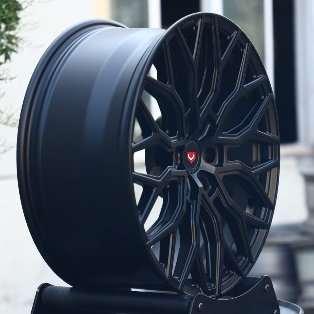 6x135 wheels – Gloss Black 12 Y-Spoke (Vossen HF-2-Style), side view