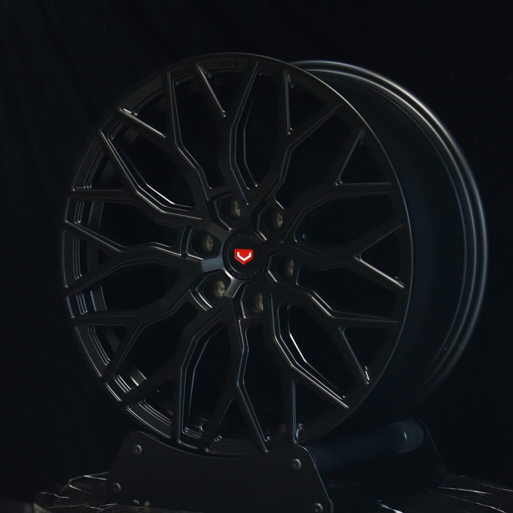 Ram 1500 wheels – Gloss Black 12 Y-Spoke (Vossen HF-2-Style), angled view