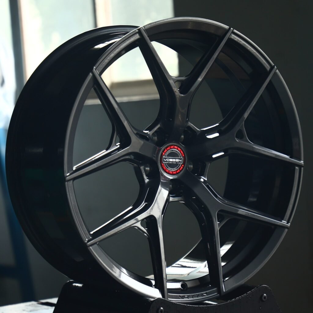 Tesla Model Y wheels – Gloss Black 5 Y-Spoke (Vossen HF-5-Style), angled view