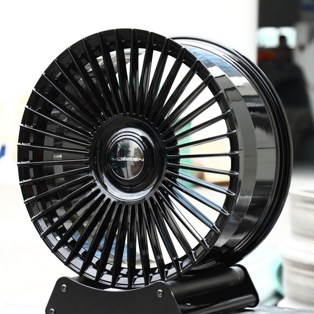 Ford Mustang wheels – Gloss Black Multi-Spoke (Vossen HF-8-Style), angled view