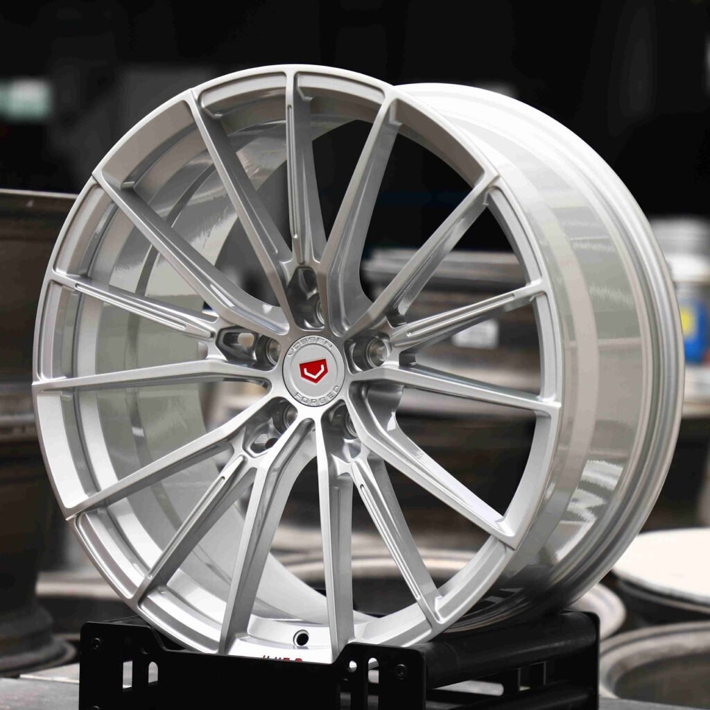 Ford Mustang wheels – Matte Silver 5 W-Spoke (Vossen VFS-2-Style), angled view