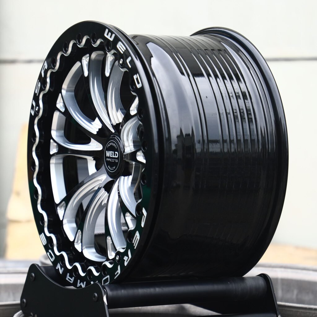 6x139.7 wheels – Weld Gloss Black Racing 10-Spoke, side view