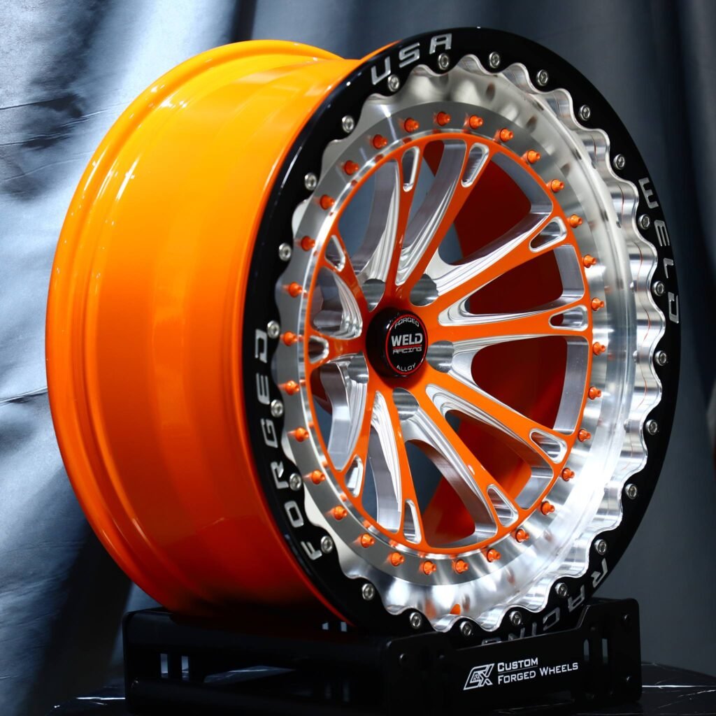 5x114.3 wheels – Weld Racing 5-Spoke Red / Black Milled Beadlock, side view