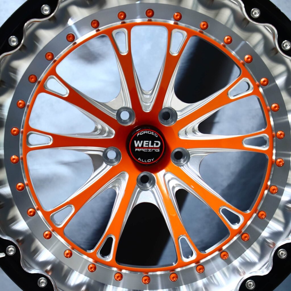 Dodge Challenger wheels – Weld Racing 5-Spoke Red / Black Milled Beadlock, lip and barrel detail