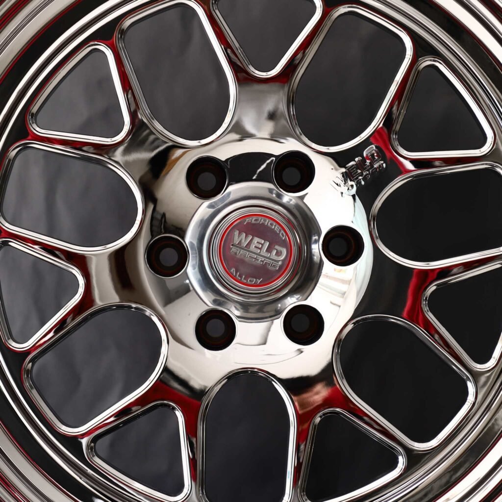 6x139.7 wheels – Chrome / Red Mesh Deep Lip (Weld Racing-Style), side view
