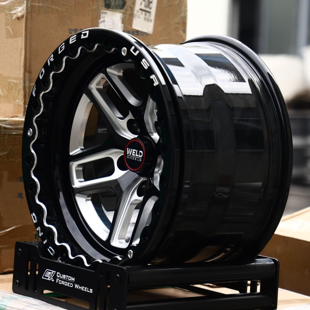 5x114.3 wheels – Gloss Black / Machined 5 Split-Spoke Beadlock (Weld Racing-Style), side view