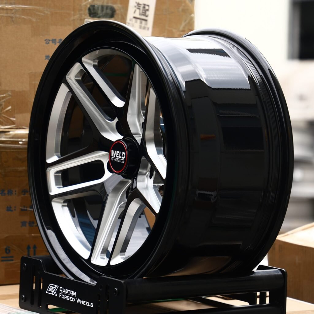 5x114.3 wheels – Gloss Black / Machined 5 Split-Spoke Beadlock (Weld Racing-Style), side view