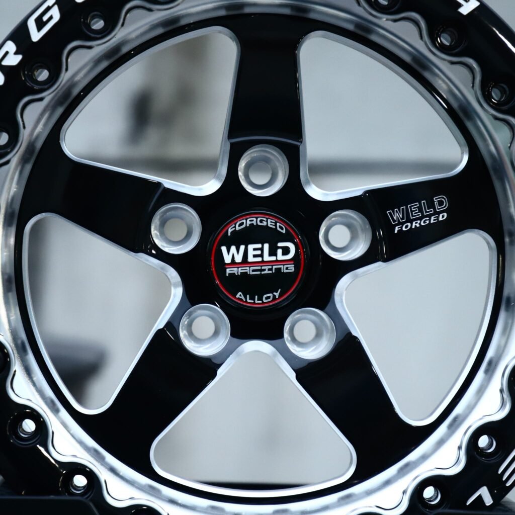 Dodge Charger wheels – Gloss Black / Machined 5-Spoke Beadlock (Weld Racing-Style), lip and barrel detail