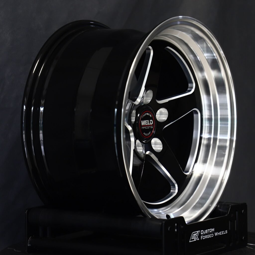 5x114.3 wheels – Gloss Black / Machined 5-Spoke Deep Lip (Weld Racing-Style), side view