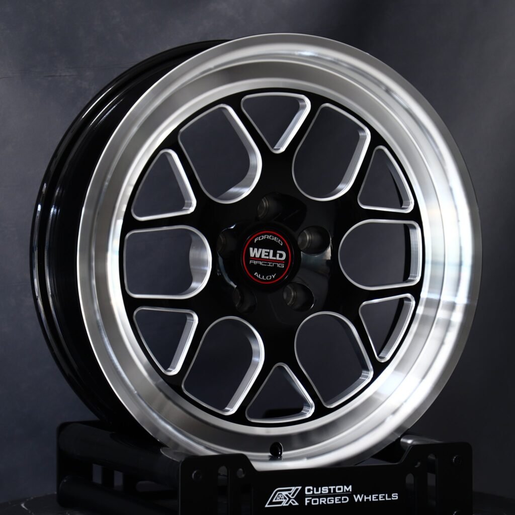 Chevrolet Corvette wheels – Gloss Black / Machined 5 Y-Spoke (Weld Racing-Style), angled view
