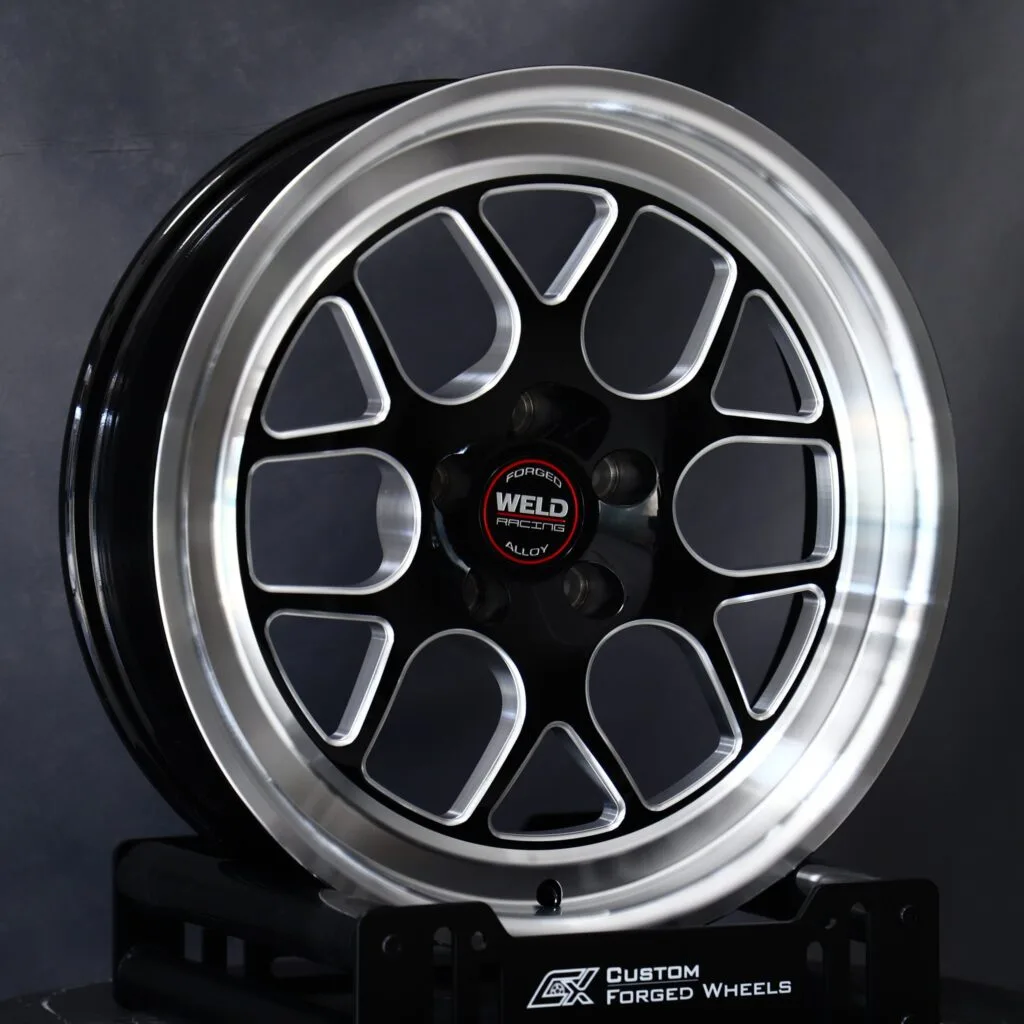 Chevrolet Corvette wheels – Gloss Black / Machined 5 Y-Spoke (Weld Racing-Style), angled view