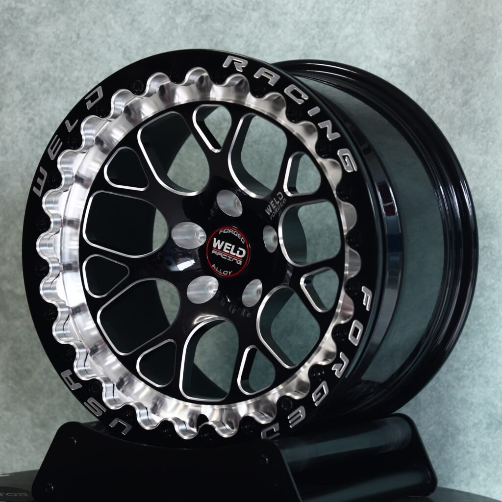 Chevrolet Corvette C7 wheels – Gloss Black / Machined Mesh Beadlock (Weld Racing-Style), angled view