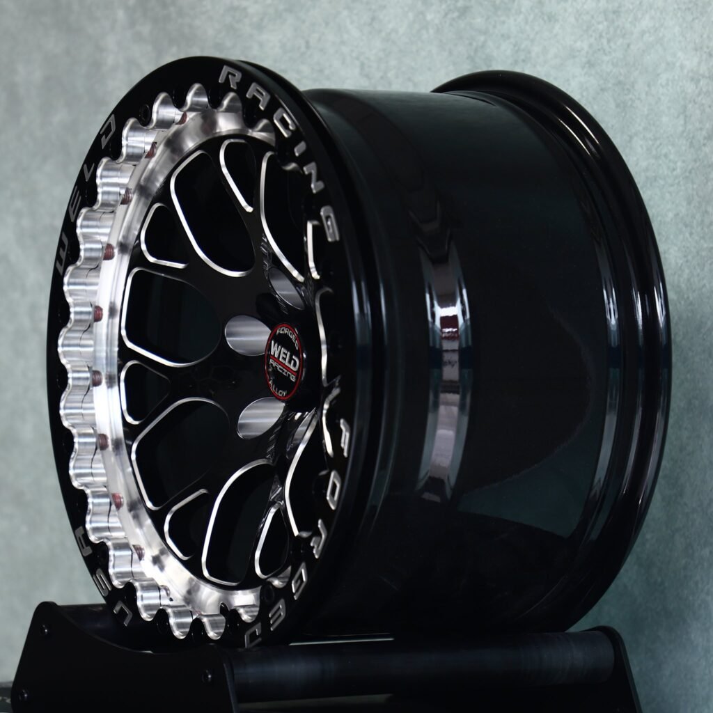 5x114.3 wheels – Gloss Black / Machined Mesh Beadlock (Weld Racing-Style), side view