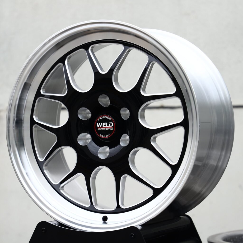 Chevrolet Silverado wheels – Gloss Black / Machined Mesh Beadlock (Weld Racing-Style), angled view