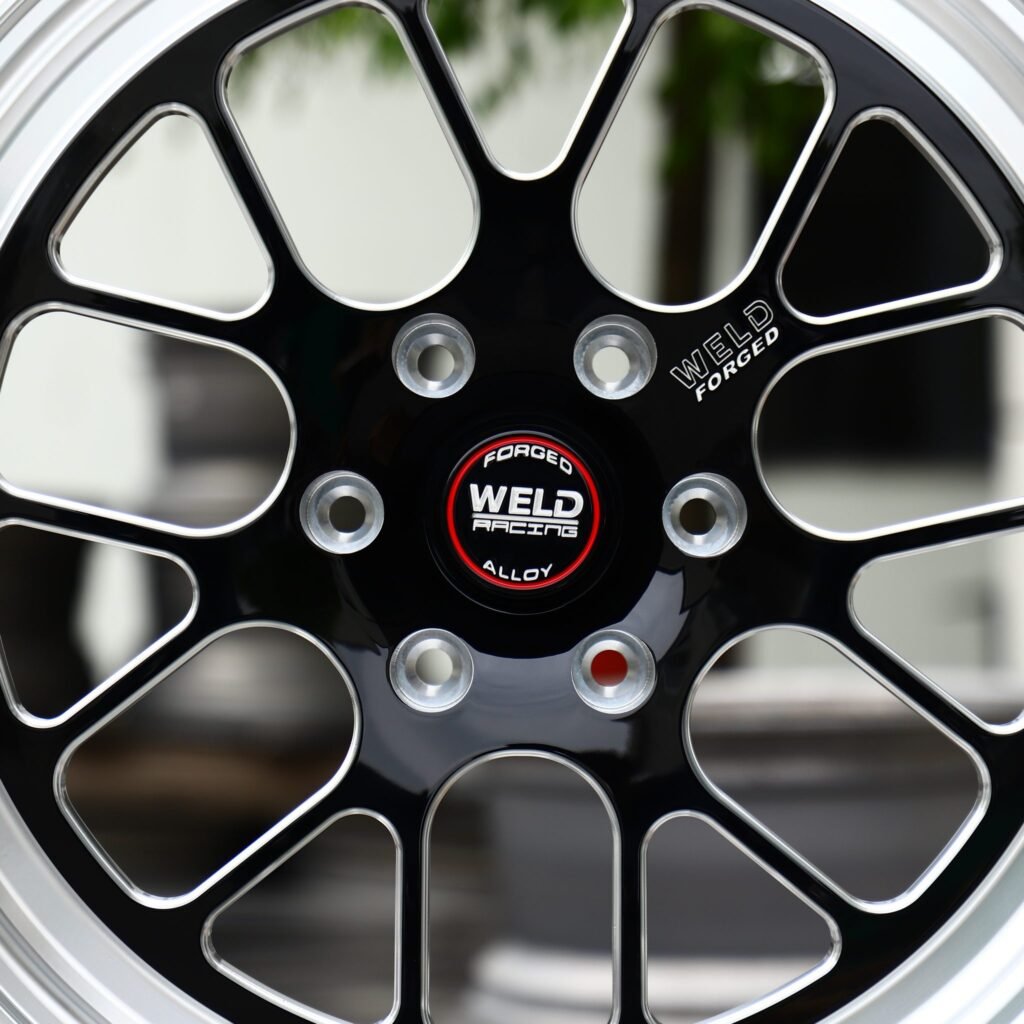 Toyota 4Runner wheels – Gloss Black Milled 12-Spoke Polished Lip (Weld Racing-Style), lip and barrel detail