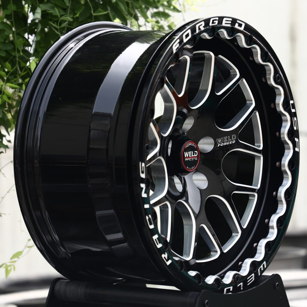 Chevrolet Corvette C7 wheels – Gloss Black Milled Mesh Beadlock (Weld Racing-Style), angled view
