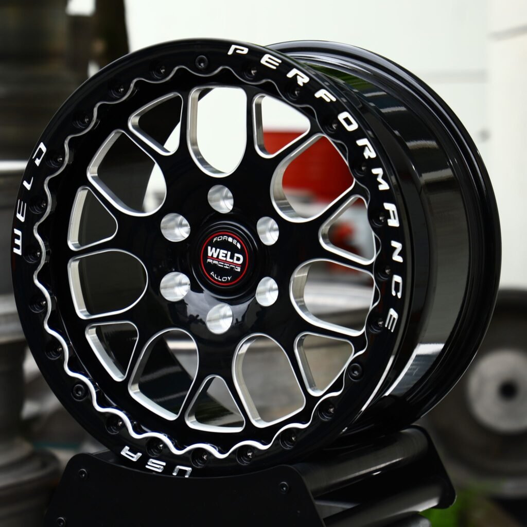 Ford F-150 wheels – Gloss Black / Mirror Milled Mesh Beadlock (Weld Racing-Style), angled view