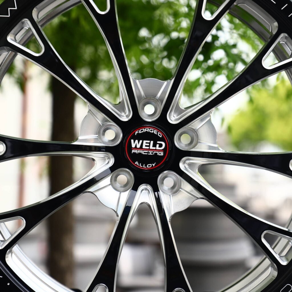 Dodge Charger wheels – Gloss Black / Mirror Milled Multi-Spoke (Weld Racing-Style), lip and barrel detail