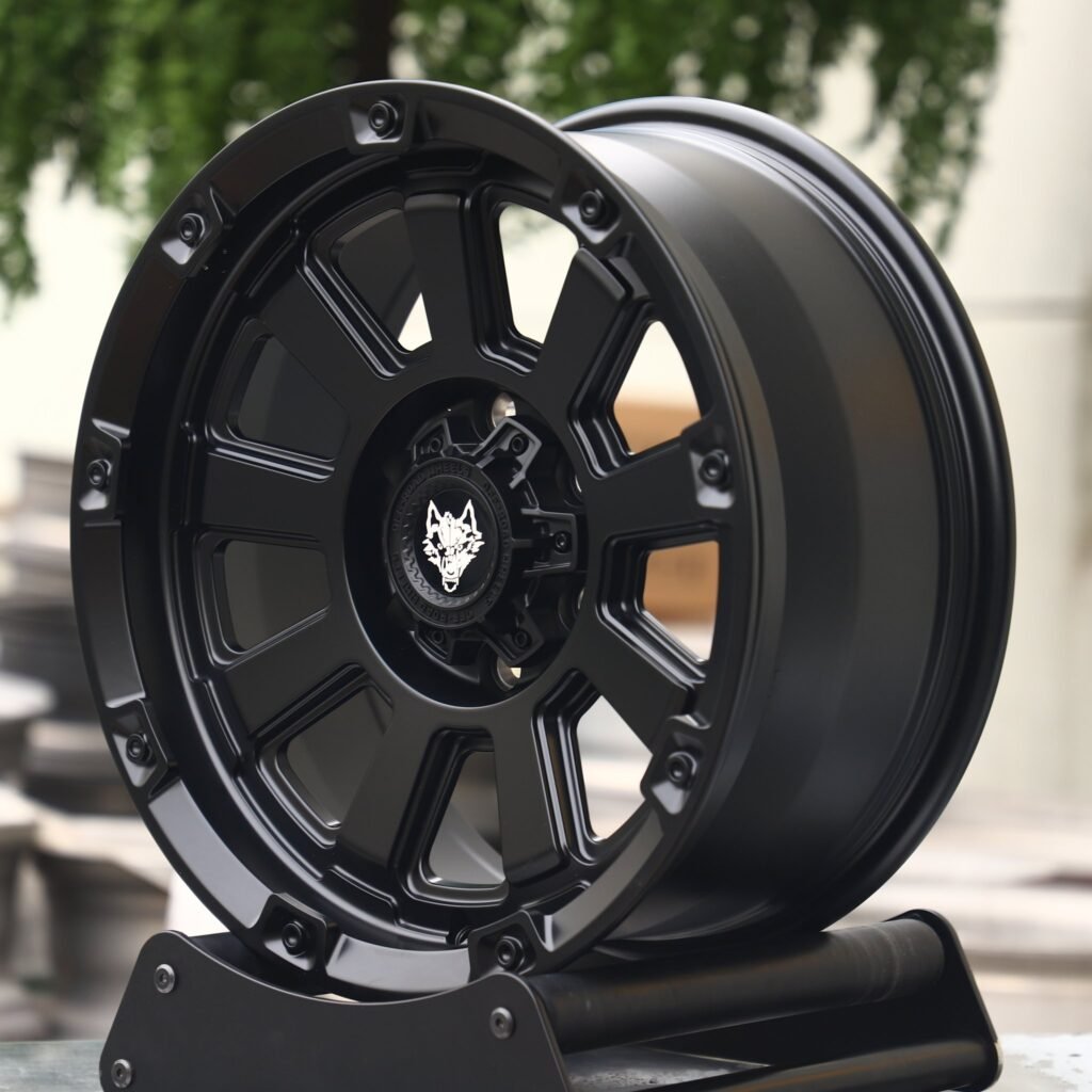 Toyota Tacoma wheels – Wolf Gloss Black Exposed Bolt Detail, angled view
