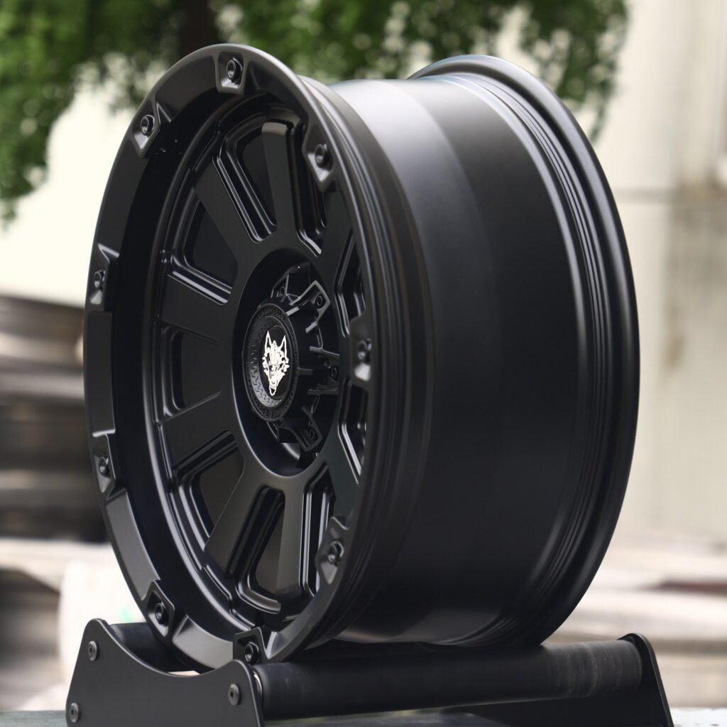 6x139.7 wheels – Wolf Gloss Black Exposed Bolt Detail, side view