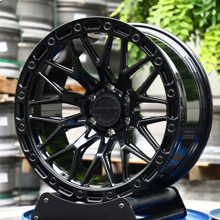 Toyota 4Runner wheels – XM XM-704 Gloss Black Multi-Spoke Faux Beadlock, front view