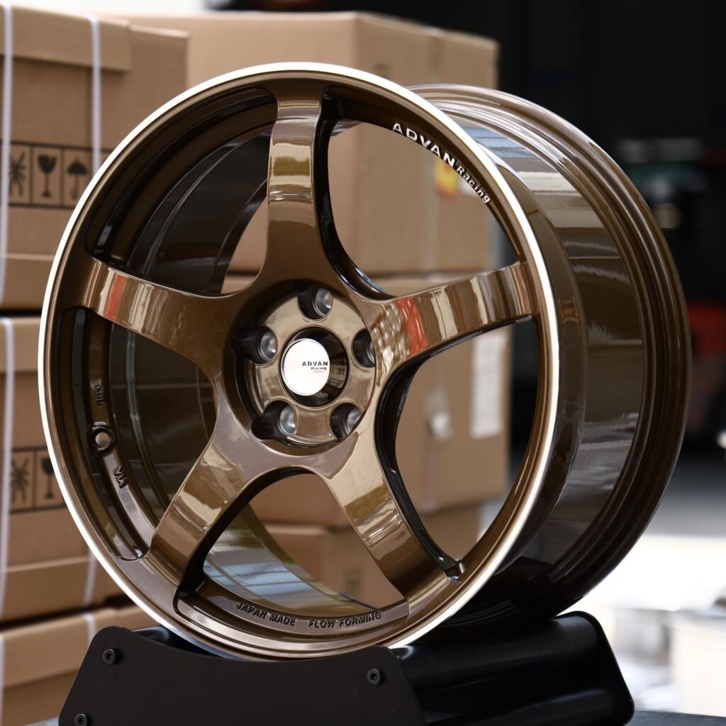 Infiniti Q50 wheels – Bronze 5-Spoke Polished Lip (Advan-Style), angled view