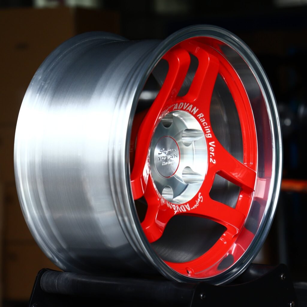 6x139.7 wheels – Red 3-Spoke Polished Lip (Advan-Style), side view
