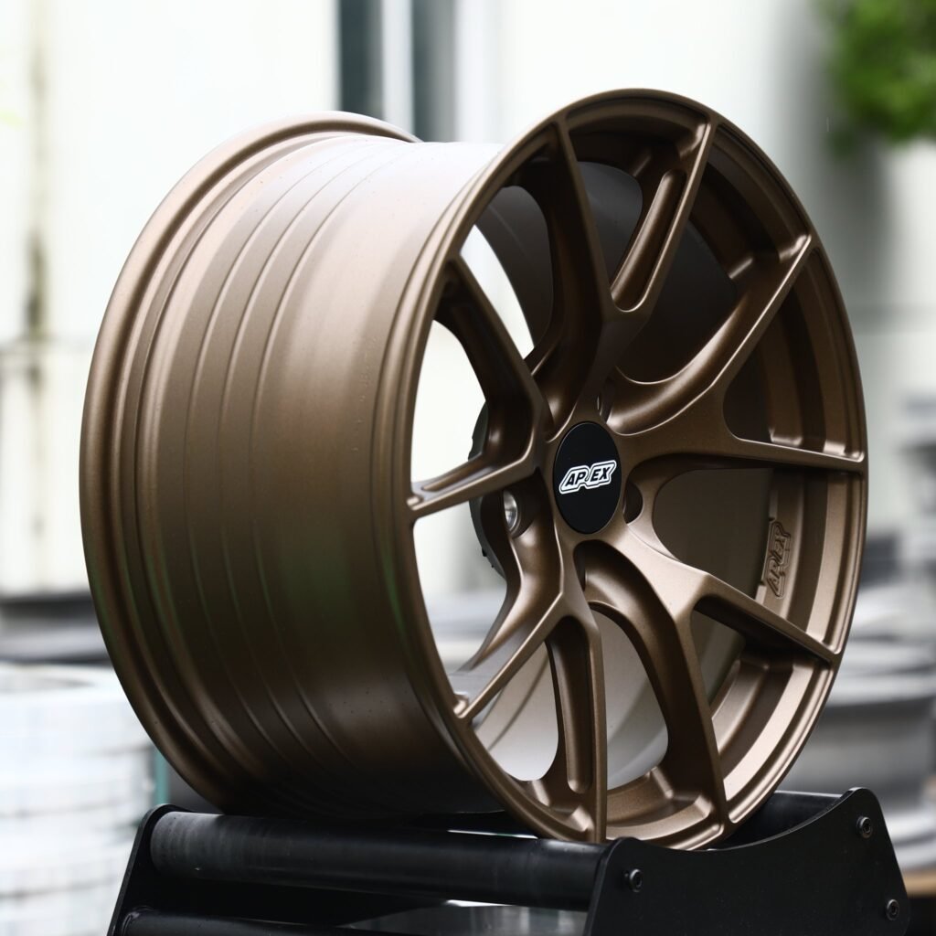 Volkswagen Golf wheels – Matte Bronze 10-Spoke Concave (APEX-Style), angled view