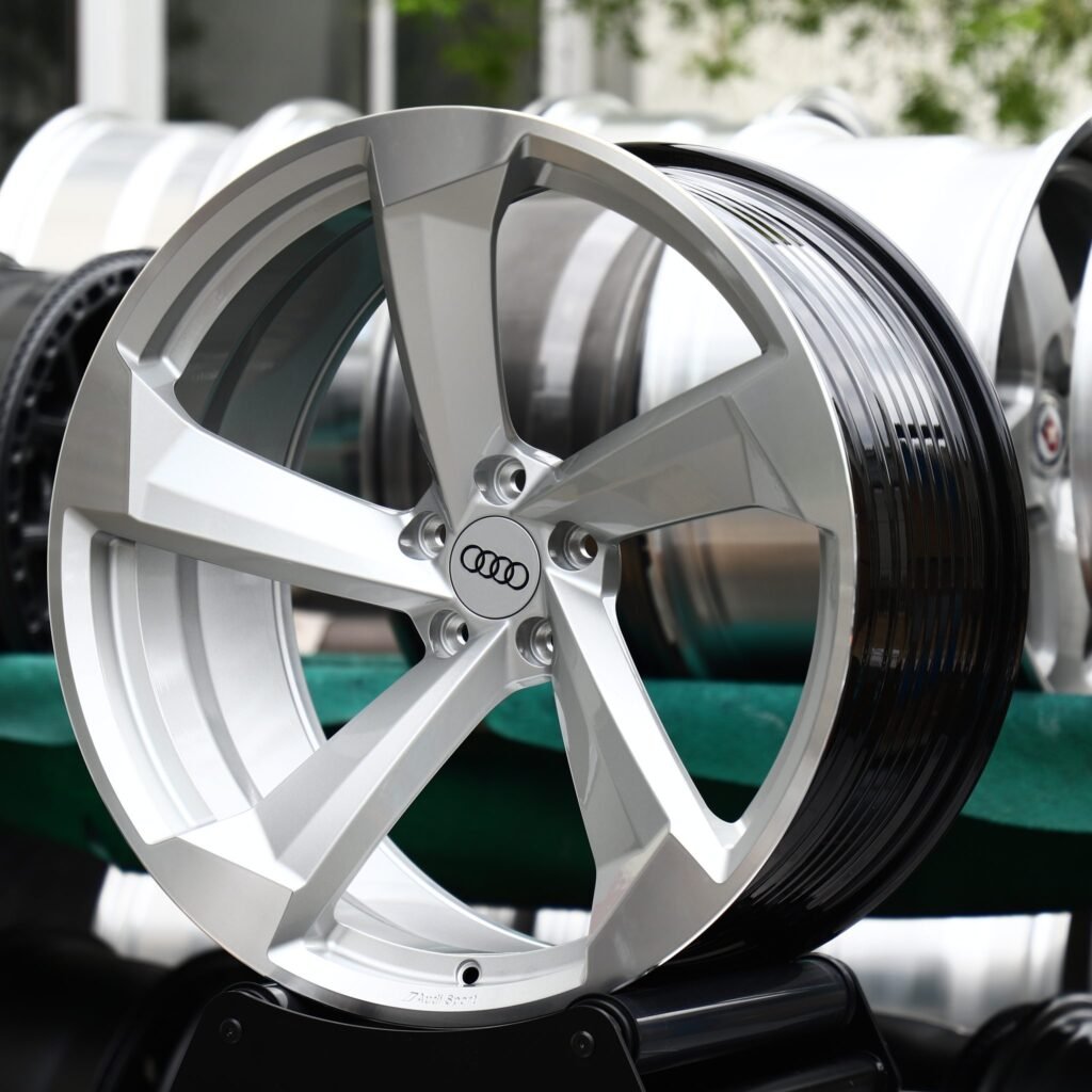 Audi Q5 wheels – Bright Silver 5-Spoke Rotor Machined (Audi OEM-Style), angled view
